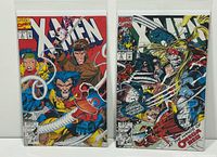 Front view of both X-Men issues #4 and #5 in bags