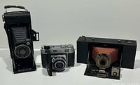 All three Kodak cameras standing side by side
