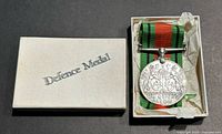 Medal with ribbon inside original box