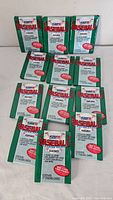 Front view of 12 sealed 1992 Fleer baseball card packs