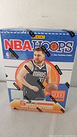 Front of sealed 2024-25 Panini NBA Hoops blaster box showing Luka Dončić image