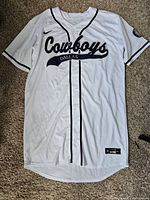 Full view of front of jersey showing design and condition