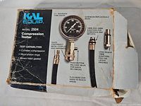Front of damaged box showing model and kit contents