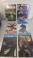 First set of six bagged comics: Batman Prodigal, Red City, Green Lantern Corps, two Batman Rebirth era issues, Bat-Family cover