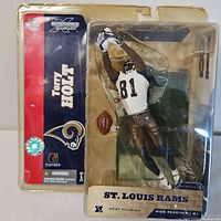 Front view of sealed McFarlane Torry Holt action figure package