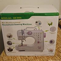 Front of retail box showing model SM-505A and product image