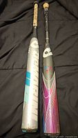 Full view of both DeMarini bats side by side