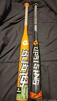 Full view of both DeMarini bats side-by-side
