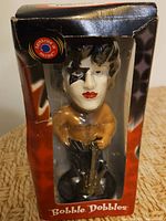 Front of boxed Paul Stanley bobblehead showing figure and Bobble Dobbles branding