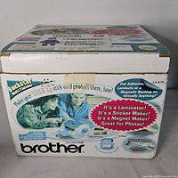 Retail box showing Brother LX-570 branding and product features