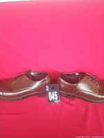 Both shoes side by side displaying uppers and lacing