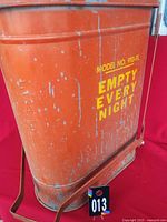 Full side view showing Eagle safety bin, model number and warning text