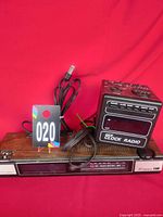 Pair of clock radios showing size and styles