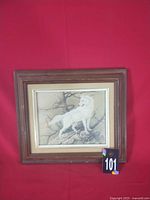 Front view of framed white wolf print