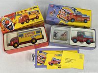 Both boxed Corgi Classics circus vehicles with inserts and paperwork visible