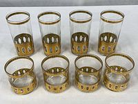 Group shot of eight Culver Antigua glasses, four highball and four double old-fashioned