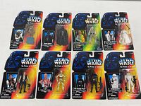 Group shot of eight sealed 1995 Star Wars Power of the Force figures