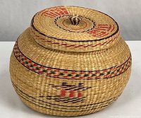 Overall view of basket with lid showing shape and pattern