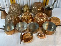 Group shot of all copper cookware and molds
