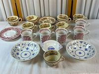 Mixed dinnerware displayed on table