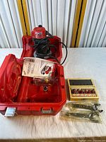 Router, carry case, manual, bit box, wrenches