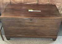 Front view of solid wood blanket chest