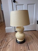 Full view of lamp with shade, base and cord