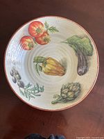 Top view showing interior vegetable design and overall condition