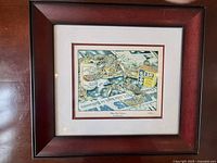 Full view of framed print showing image, mats and frame