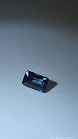 Rectangular octagon-cut blue sapphire angled view