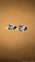 Pair of aquamarine gemstones angled view