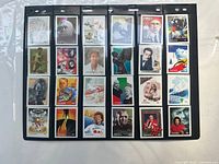 Front view of first stock page holding 25 mint 2000 Canada commemorative stamps