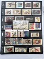 First stock page with five rows of unused Canadian stamps