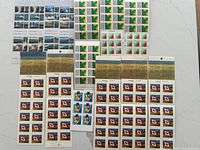 Overall layout of multiple 2006 mint Canadian stamp panes and booklets