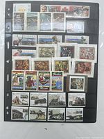 Full view first stock page with multiple rows of mint Canadian stamps