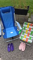 Blue adult beach chair, plaid child beach chair, purple and pink kids water shoes