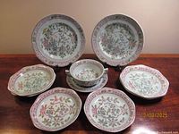 Group of all ten Singapore Bird pieces