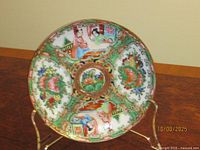 Front view of entire plate on stand