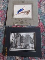 Both matted artworks together for scale and context