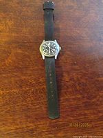 Full view of watch with strap extended