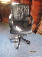 Front view of black leather Effezeta office chair