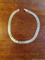 Full view of choker necklace laid out