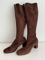 Full view of both boots upright showing overall style, height and condition