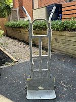 Front view of padded two-wheel dolly