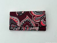 Front view of folded key holder showing full paisley pattern