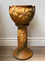 Jardiniere placed on matching pedestal showing full assembled height