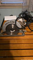 Full view of Skilsaw circular saw on table