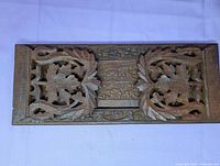 folded carved wood book stand top view