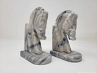 Front angled view of both onyx horse head bookends