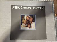 Front jacket showing album title and band photo